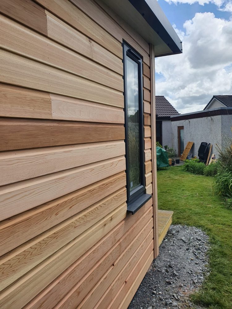 our standard western red cedar cladding completes the exterior of our garden rooms
